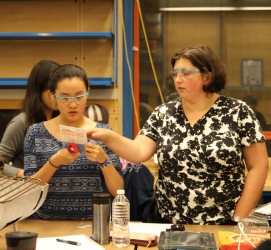 Professor Amy Banzaert instructs a student